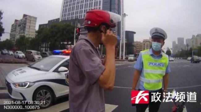 电动车闯红灯怎么处罚（骑电动车闯红灯被警告）